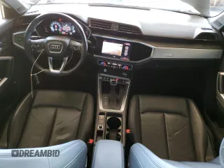 2020 Audi Q3 Premium with VIN WA1AECF34L1034797, listed as a Copart auction lot 51096385 with 74,192 mi miles and Salvage title. Bid and sale history available at DreamBid. Image 8.