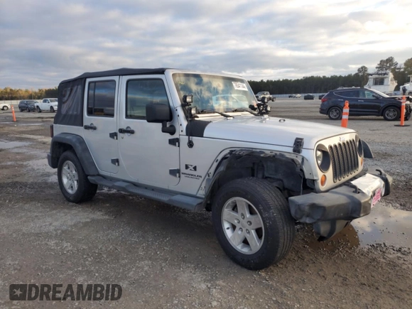2008 Jeep Wrangler Unlimited X with VIN 1J4GB39138L517920, listed as a Copart auction lot 76541144 with 213,002 mi miles and Salvage Title. Bid and sale history available at DreamBid. Image 4.