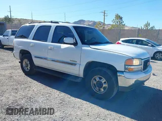 2002 GMC Yukon SLT with VIN 1GKEC13T32R256757, listed as a IAAI auction lot 41657945 with 331,831 mi miles. Bid and sale history available at carsss.com. Image 1.