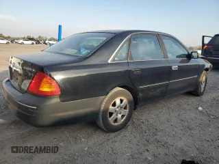 2001 Toyota Avalon XL z VIN 4T1BF28B61U175674, wystawiony jako Copart lot #49913765 z przebiegiem 170 245 mil mil oraz Tytuł czysty. Historia ofert i sprzedaży dostępna na DreamBid. Obrazek 3.
