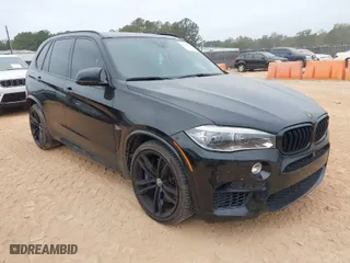 2018 BMW X5 M with VIN 5YMKT6C59J0Y83423, listed as a IAAI auction lot 40700752 with 69,949 mi miles. Bid and sale history available at carsss.com. Image 1.
