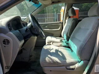 2000 Honda Odyssey LX z VIN 2HKRL1856YH626249, wystawiony jako Copart lot #57246805 z przebiegiem 179 546 mil mil oraz Szkoda całkowita • Salvage title. Historia ofert i sprzedaży dostępna na DreamBid. Obrazek 7.