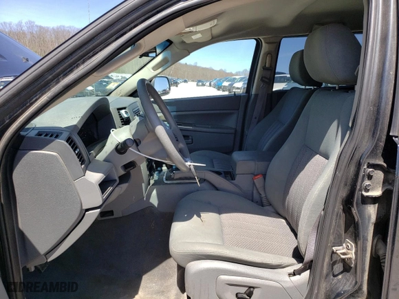 2005 Jeep Grand Cherokee Laredo with VIN 1J4GR48K95C628365, listed as a Copart auction lot 52524515 with 214,630 mi miles and Clean Title. Bid and sale history available at carsss.com. Image 7.