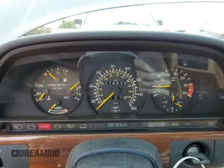 1990 Mercedes-Benz 420 with VIN WDBCA35E8LA539818, listed as a Copart auction lot 45764444 with 219,036 mi miles and Salvage Title. Bid and sale history available at carsss.com. Image 9.