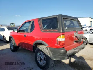 1999 Isuzu Rodeo z VIN 4S2CK57W3X4301044, wystawiony jako Copart lot #75758024 z przebiegiem 209 456 mil mil oraz Tytuł czysty. Historia ofert i sprzedaży dostępna na DreamBid. Obrazek 2.