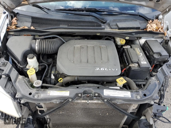 2012 Dodge Grand Caravan SXT with VIN 2C4RDGCG5CR327937, listed as a Copart auction lot 52905955 with 168,382 mi miles and Salvage Title. Bid and sale history available at DreamBid. Image 12.