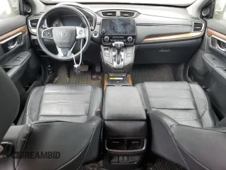 2020 Honda CR-V Touring z VIN 2HKRW2H9XLH236764, wystawiony jako Copart lot #59693475 z przebiegiem Nie podano mil oraz Czysty tytuł • Clean title. Historia ofert i sprzedaży dostępna na DreamBid. Obrazek 8.