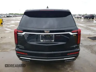 2023 Cadillac XT6 FWD Premium Luxury z VIN 1GYKPCRS5PZ101867, wystawiony jako Copart lot #51773545 z przebiegiem 31 322 mil mil oraz Szkoda całkowita • Salvage title. Historia ofert i sprzedaży dostępna na DreamBid. Obrazek 6.