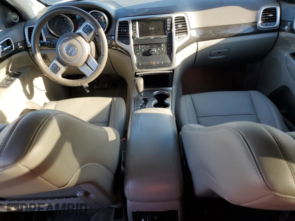 2011 Jeep Grand Cherokee Laredo with VIN 1J4RR4GG5BC503705, listed as a Copart auction lot 50014895 with 180,999 mi miles and Salvage title. Bid and sale history available at DreamBid. Image 8.