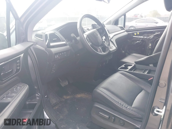 2023 Honda Odyssey Touring with VIN 5FNRL6H86PB065670, listed as a IAAI auction lot 41691093 with 22,518 mi miles and . Bid and sale history available at DreamBid. Image 5.