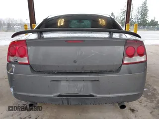 2010 Dodge Charger SXT with VIN 2B3CA3CV1AH250204, listed as a IAAI auction lot 41692787 with 111,757 mi miles. Bid and sale history available at carsss.com. Image 17.