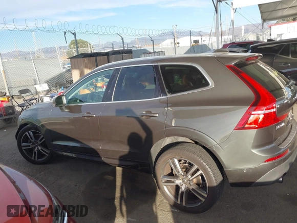 2019 Volvo XC60 Momentum with VIN LYV102RKXKB196748, listed as a IAAI auction lot 41261328 with 74,925 mi miles and . Bid and sale history available at DreamBid. Image 15.