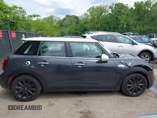 2019 MINI Hardtop 4 Door Cooper S z VIN WMWXU3C54K2H86856, wystawiony jako IAAI lot #42201474 z przebiegiem 56 610 mil mil oraz . Historia ofert i sprzedaży dostępna na DreamBid. Obrazek 13.