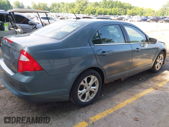 2012 Ford Fusion SE with VIN 3FAHP0HA5CR263705, listed as a IAAI auction lot 42583137 with 184,407 mi miles and . Bid and sale history available at DreamBid. Image 4.