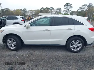 2013 Acura RDX z VIN 5J8TB3H30DL012632, wystawiony jako IAAI lot #41852557 z przebiegiem 166 543 mil mil oraz . Historia ofert i sprzedaży dostępna na DreamBid. Obrazek 14.