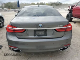 2019 BMW 7 Series 740i z VIN WBA7E2C50KB454532, wystawiony jako Copart lot #89005785 z przebiegiem 93 921 mil mil oraz Czysty tytuł • Clean title. Historia ofert i sprzedaży dostępna na DreamBid. Obrazek 6.