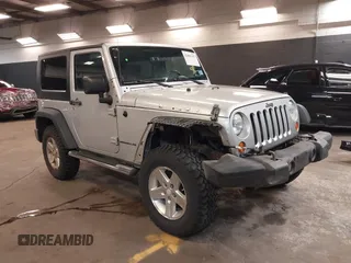 2008 Jeep Wrangler Rubicon z VIN 1J8GA64198L512120, wystawiony jako IAAI lot #42091137 z przebiegiem 51 178 mil mil oraz . Historia ofert i sprzedaży dostępna na DreamBid. Obrazek 1.
