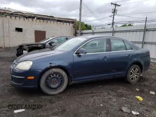 2006 Volkswagen Jetta z VIN 3VWSG81K86M798947, wystawiony jako Copart lot #57257545 z przebiegiem 160 722 mil mil oraz Szkoda całkowita • Salvage title. Historia ofert i sprzedaży dostępna na DreamBid. Obrazek 1.