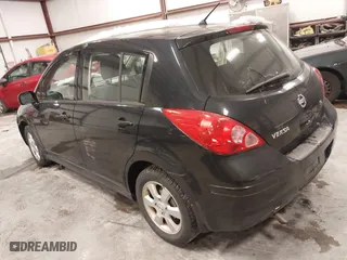 2009 Nissan Versa 1.8 S with VIN 3N1BC13E99L393142, listed as a IAAI auction lot 41377246 with 115,591 mi miles. Bid and sale history available at carsss.com. Image 3.