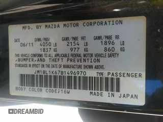 2011 Mazda 3 s Sport with VIN JM1BL1K67B1496970, listed as a IAAI auction lot 42155075 with 158,725 mi miles. Bid and sale history available at carsss.com. Image 9.