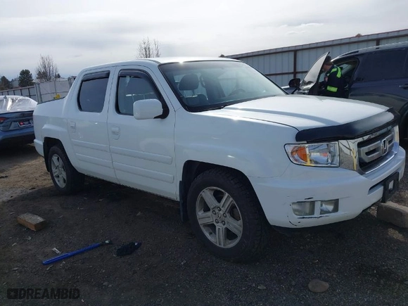 2011 Honda Ridgeline RTL with VIN 5FPYK1F52BB454283, listed as a IAAI auction lot 41841235 with 1 mi miles. Bid and sale history available at carsss.com. Image 1.