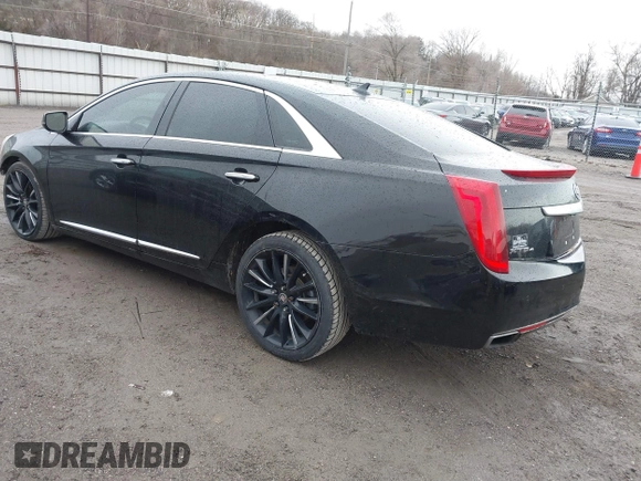 2014 Cadillac XTS Platinum with VIN 2G61W5S84E9291640, listed as a IAAI auction lot 41877867 with 100,462 mi miles and . Bid and sale history available at DreamBid. Image 3.