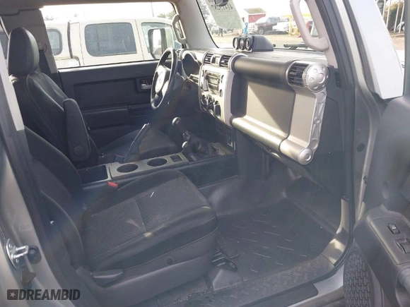 2010 Toyota FJ Cruiser with VIN JTEBU4BF6AK096501, listed as a IAAI auction lot 41413287 with 236,788 mi miles. Bid and sale history available at carsss.com. Image 5.