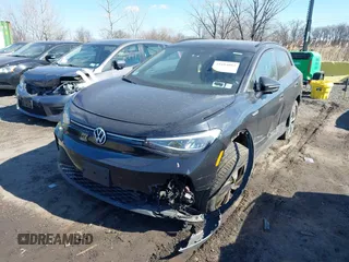 2023 Volkswagen ID.4 Pro with VIN 1V2CMPE8XPC018893, listed as a IAAI auction lot 41694083 with 31,875 mi miles and . Bid and sale history available at DreamBid. Image 21.