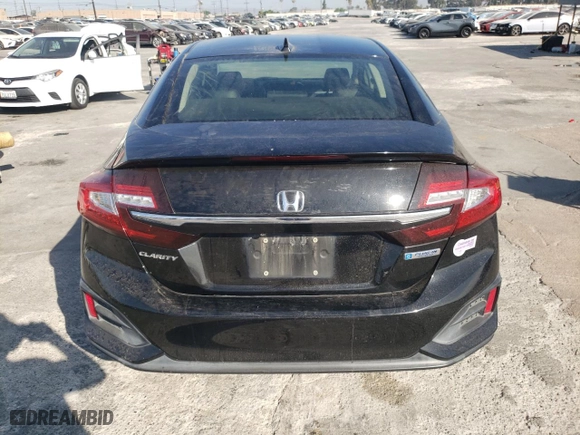 2018 Honda Clarity Plug-In Hybrid with VIN JHMZC5F10JC019657, listed as a Copart auction lot 64268553 with 69,581 mi miles. Bid and sale history available at carsss.com. Image 6.