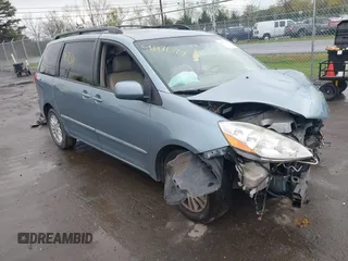 2008 Toyota Sienna XLE with VIN 5TDZK22C48S153784, listed as a IAAI auction lot 41971319 with 126,071 mi miles. Bid and sale history available at carsss.com. Image 1.