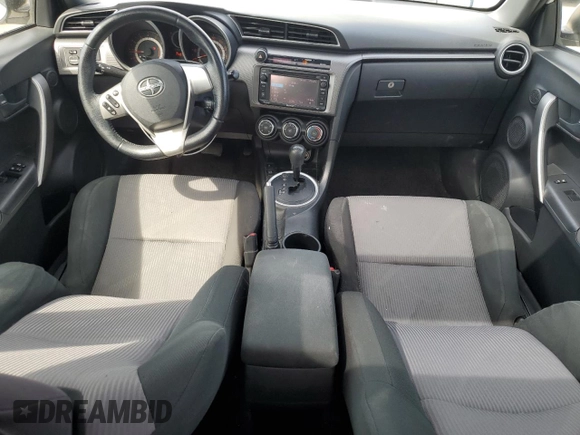 2014 Scion tC z VIN JTKJF5C70E3084697, wystawiony jako Copart lot #54307295 z przebiegiem 174 073 mil mil oraz Szkoda całkowita • Salvage title. Historia ofert i sprzedaży dostępna na DreamBid. Obrazek 8.