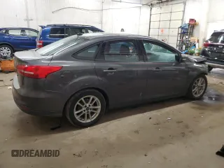 2016 Ford Focus SE z VIN 1FADP3F20GL305441, wystawiony jako Copart lot #55445105 z przebiegiem 117 033 mil mil oraz Szkoda całkowita • Salvage title. Historia ofert i sprzedaży dostępna na DreamBid. Obrazek 3.