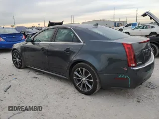 2010 Cadillac CTS Premium with VIN 1G6DS5EV9A0104827, listed as a Copart auction lot 81690744 with 81,813 mi miles and Salvage title. Bid and sale history available at DreamBid. Image 2.