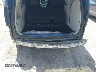2014 Dodge Grand Caravan SXT with VIN 2C4RDGCG3ER266199, listed as a IAAI auction lot 42119064 with 148,067 mi miles and . Bid and sale history available at DreamBid. Image 6.