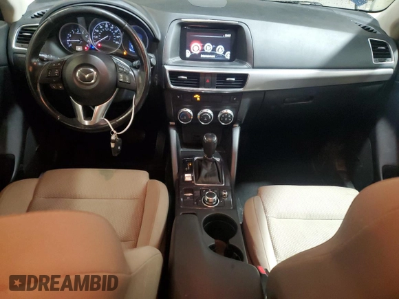 2016 Mazda CX-5 Touring z VIN JM3KE4CY4G0838908, wystawiony jako Copart lot #57961625 z przebiegiem 178 615 mil mil oraz Szkoda całkowita • Salvage title. Historia ofert i sprzedaży dostępna na DreamBid. Obrazek 8.