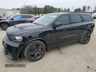 2018 Dodge Durango SRT with VIN 1C4SDJGJ4JC272083, listed as a Copart auction lot 48949115 with 62,801 mi miles and Salvage Title. Bid and sale history available at DreamBid. Image 1.