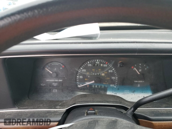 1991 Ford Taurus with VIN 1FACP52U9MG101093, listed as a Copart auction lot 45948105 with 594,696 mi miles and Salvage title. Bid and sale history available at DreamBid. Image 9.