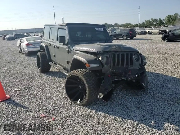 2018 Jeep Wrangler Unlimited Rubicon with VIN 1C4HJXFN9JW315938, listed as a Copart auction lot 86741084 with 83,965 mi miles and Salvage title. Bid and sale history available at DreamBid. Image 12.