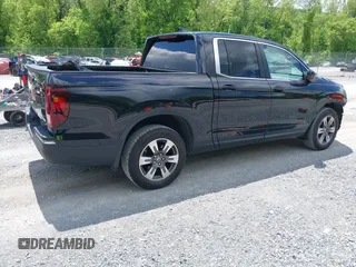 2017 Honda Ridgeline RTL with VIN 5FPYK3F51HB013989, listed as a IAAI auction lot 42206513 with 146,124 mi miles and . Bid and sale history available at DreamBid. Image 4.