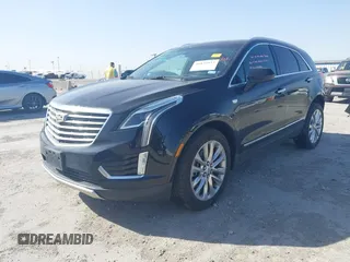 2017 Cadillac XT5 Platinum AWD z VIN 1GYKNFRS7HZ103127, wystawiony jako IAAI lot #41830037 z przebiegiem 82 480 mil mil oraz . Historia ofert i sprzedaży dostępna na DreamBid. Obrazek 18.
