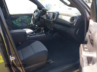 2023 Toyota Tacoma SR5 z VIN 3TMDZ5BN6PM153633, wystawiony jako IAAI lot #42353187 z przebiegiem 50 020 mil mil oraz . Historia ofert i sprzedaży dostępna na DreamBid. Obrazek 5.