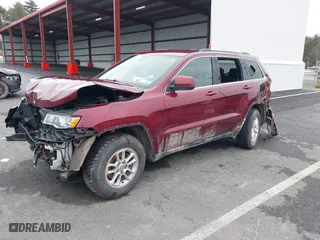 2019 Jeep Grand Cherokee Laredo E with VIN 1C4RJFAG2KC814154, listed as a IAAI auction lot 38877814 with 54,119 mi miles. Bid and sale history available at carsss.com. Image 20.