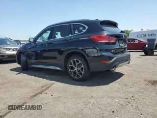2021 BMW X1 xDrive28i with VIN WBXJG9C06M5S33201, listed as a Copart auction lot 66391015 with 53,395 mi miles and Salvage title. Bid and sale history available at DreamBid. Image 2.