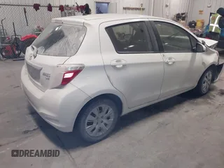 2013 Toyota Yaris L with VIN JTDKTUD33DD566664, listed as a IAAI auction lot 41524571 with 148,050 mi miles and . Bid and sale history available at DreamBid. Image 4.