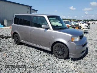 2006 Scion xB z VIN JTLKT324564100800, wystawiony jako Copart lot #56410185 z przebiegiem 205 113 mil mil oraz Szkody całkowita. Historia ofert i sprzedaży dostępna na DreamBid. Obrazek 4.