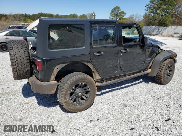 2014 Jeep Wrangler Unlimited Sport with VIN 1C4BJWDG7EL257811, listed as a Copart auction lot 50112335 with 218,530 mi miles and Salvage Title. Bid and sale history available at carsss.com. Image 3.
