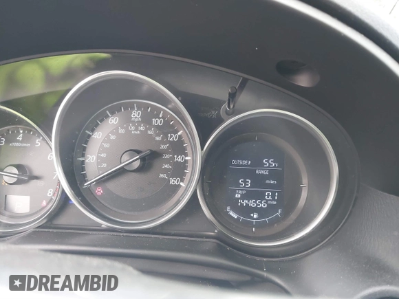 2016 Mazda CX-5 Touring with VIN JM3KE2CY3G0877185, listed as a IAAI auction lot 41729243 with 144,656 mi miles. Bid and sale history available at carsss.com. Image 15.