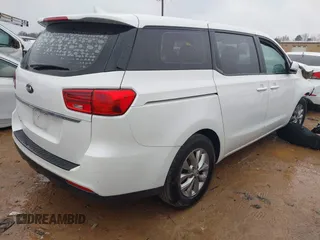 2020 Kia Sedona L with VIN KNDMA5C17L6595852, listed as a IAAI auction lot 41566584 with 102,712 mi miles. Bid and sale history available at carsss.com. Image 4.