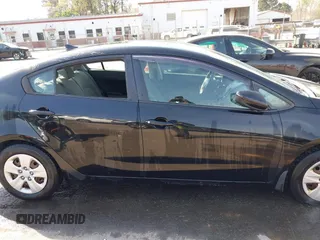 2014 Kia Forte LX with VIN KNAFK4A69E5147424, listed as a IAAI auction lot 41913598 with 117,503 mi miles. Bid and sale history available at carsss.com. Image 13.
