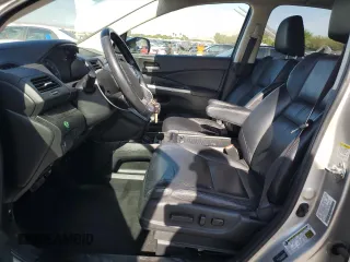 2012 Honda CR-V EX-L with VIN 2HKRM4H7XCH615277, listed as a Copart auction lot 57684505 with 106,741 mi miles and Salvage title. Bid and sale history available at DreamBid. Image 7.